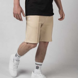 Guy in Baller Boys Ecru Baseline Shorts and Black Dribble Tank Top