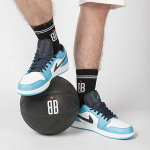 Guy wearing Baller Boys Black Rebound socks with Blue Nike sneakers
